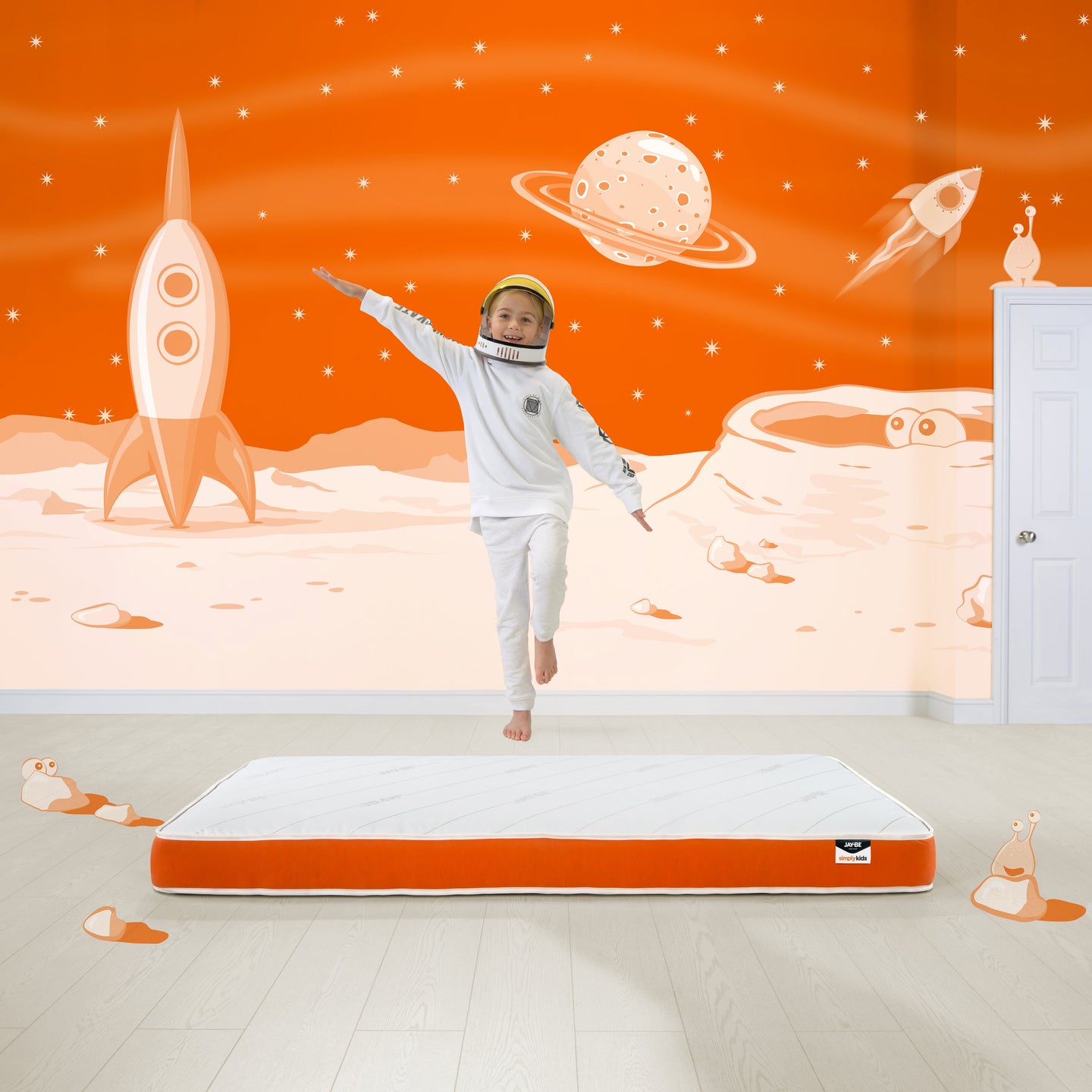 Foam free sprung single mattress in space-themed children’s room.