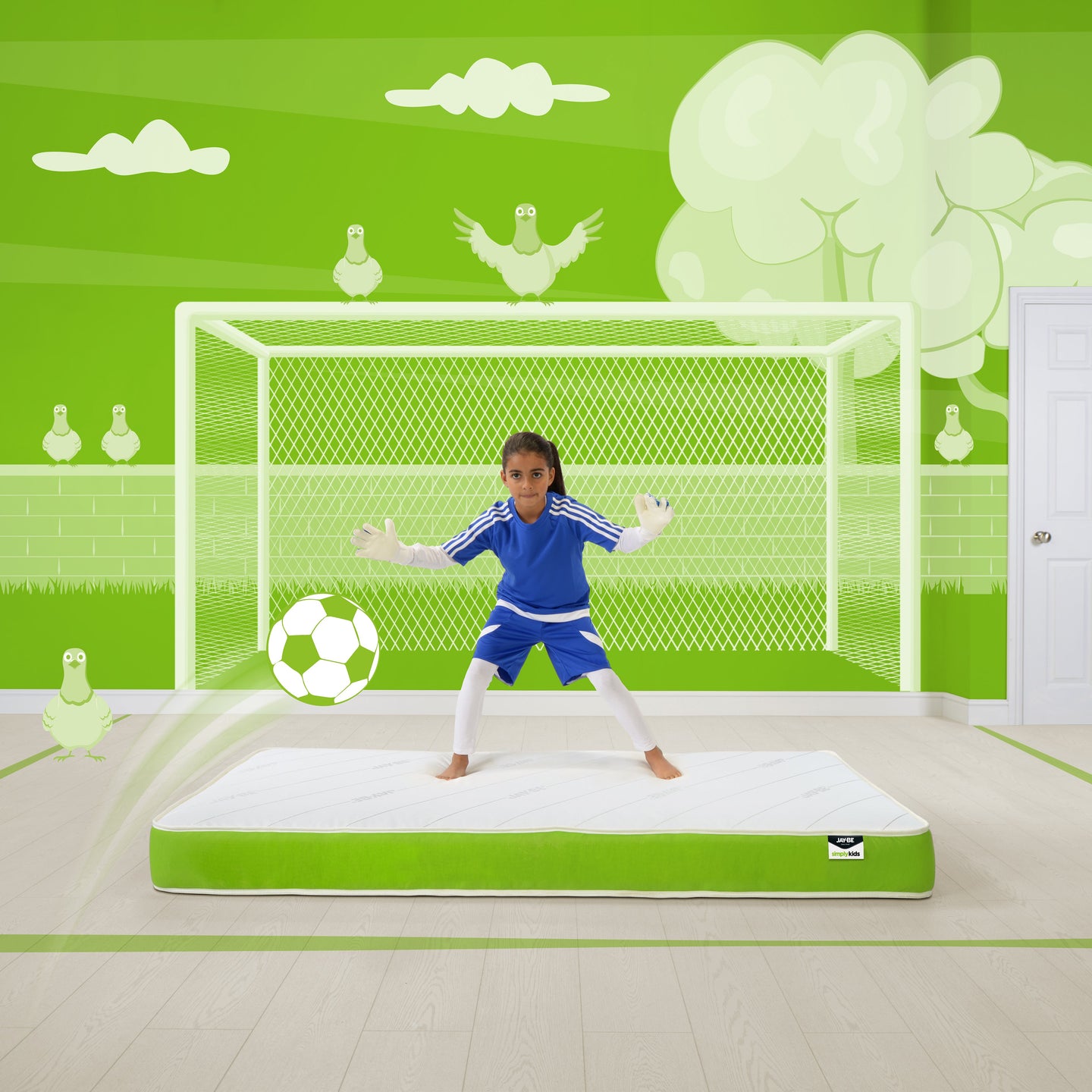 Jay-Be Anti-Allergy Foam-Free Sprung Single Mattress in children’s bedroom with soccer theme, featuring green and white decor.