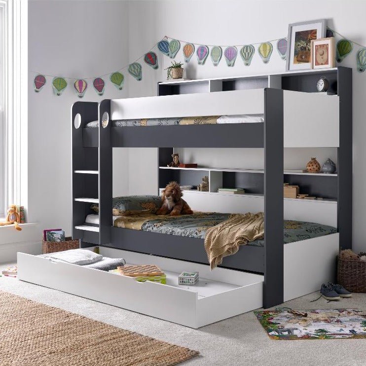 Oliver Bunk Bed with storage, shelves, and pull-out drawer in children's room.