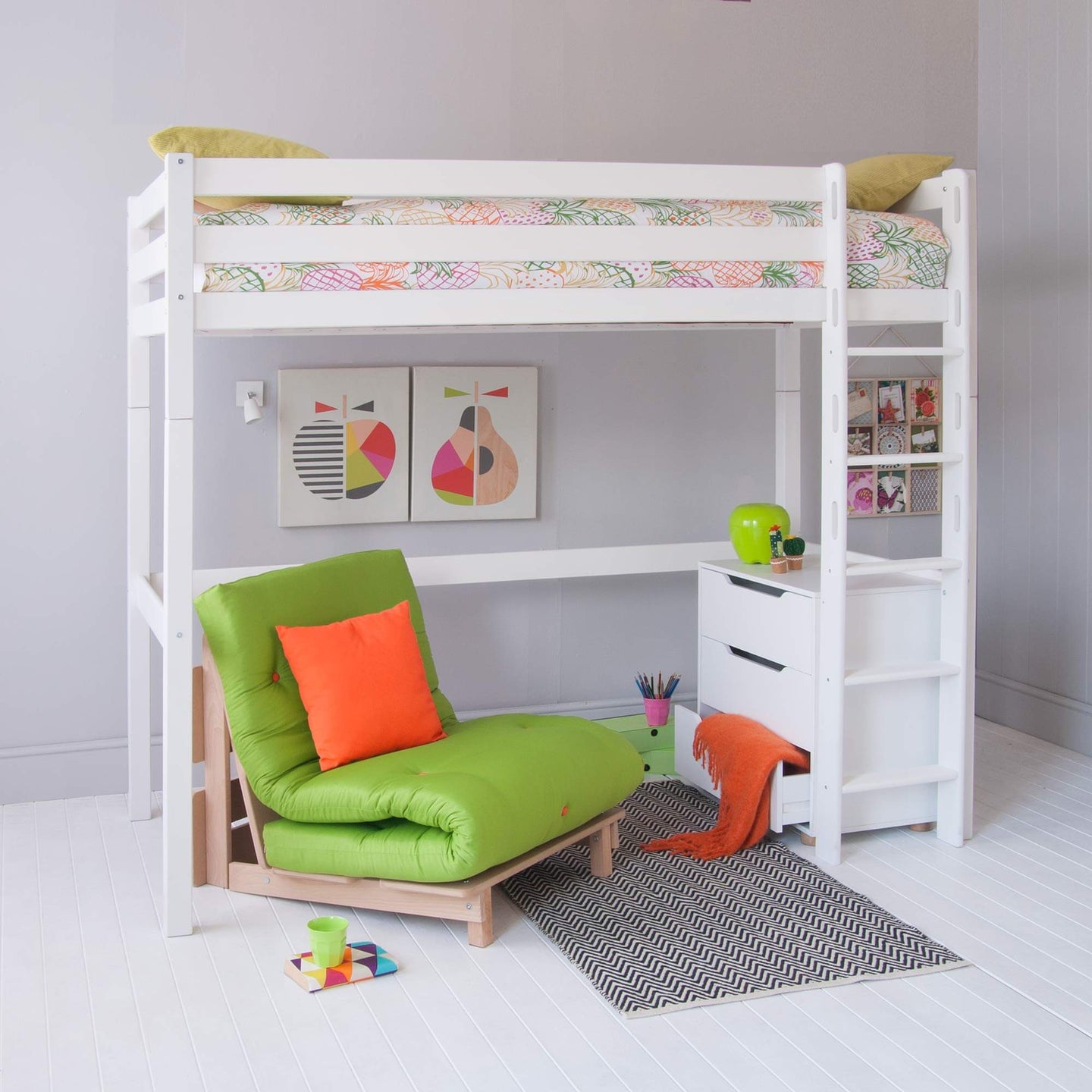 Classic Beech High Sleeper Bed with futon chair and white freestanding desk in a modern children's room.