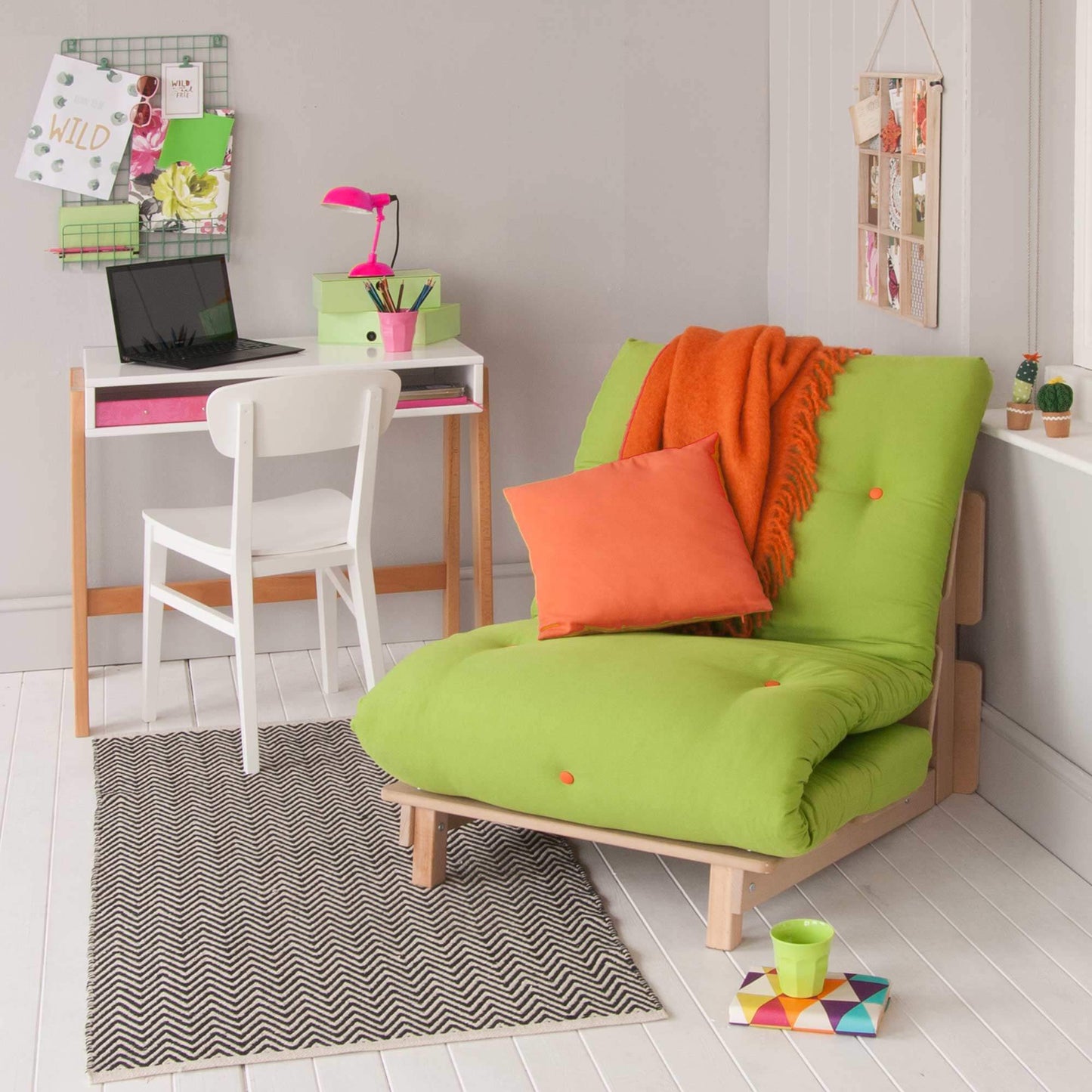 Classic Beech High Sleeper Bed with green futon and desk in a modern bedroom setup.