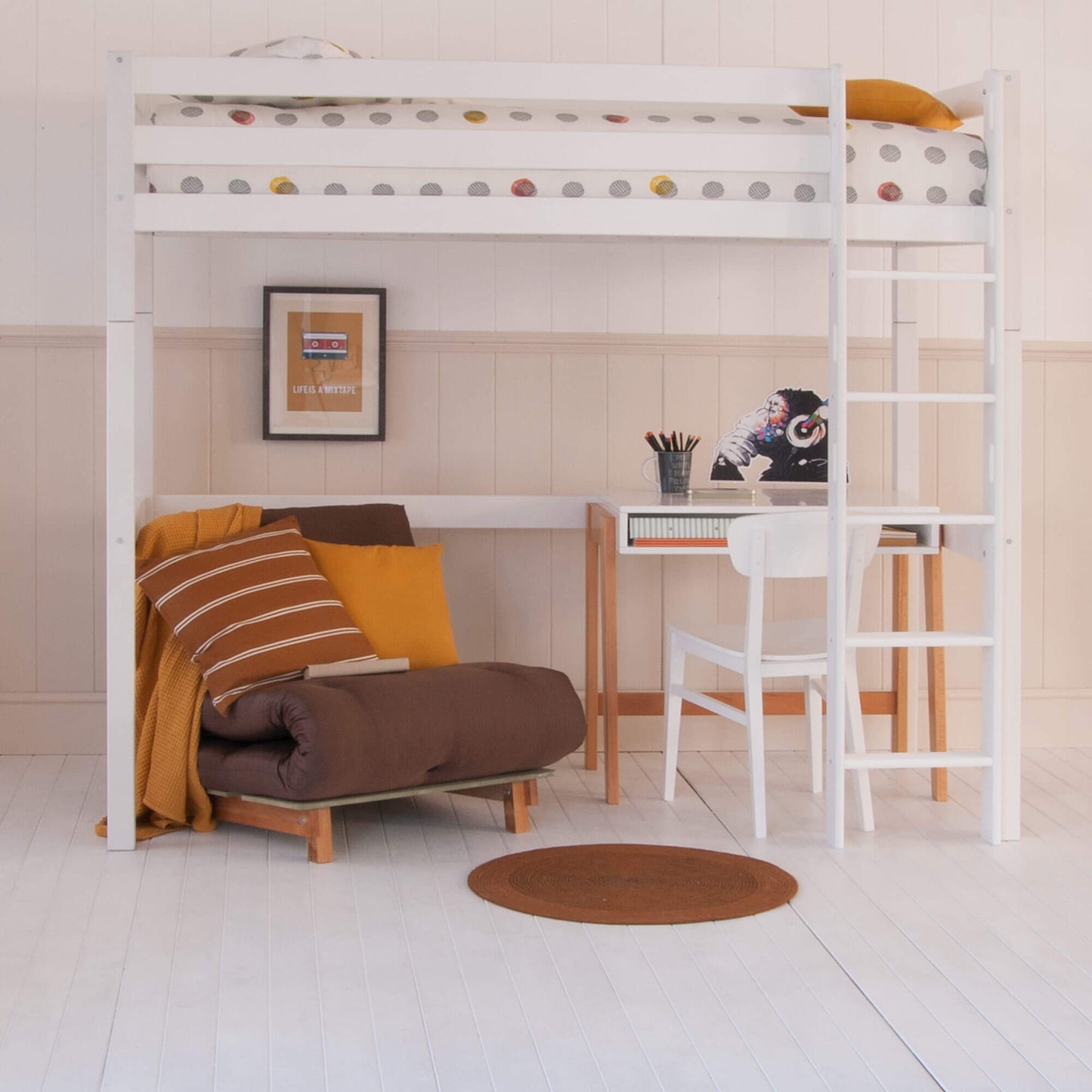 Classic beech high sleeper bed with futon, bookcase, and desk in Scandinavian design.