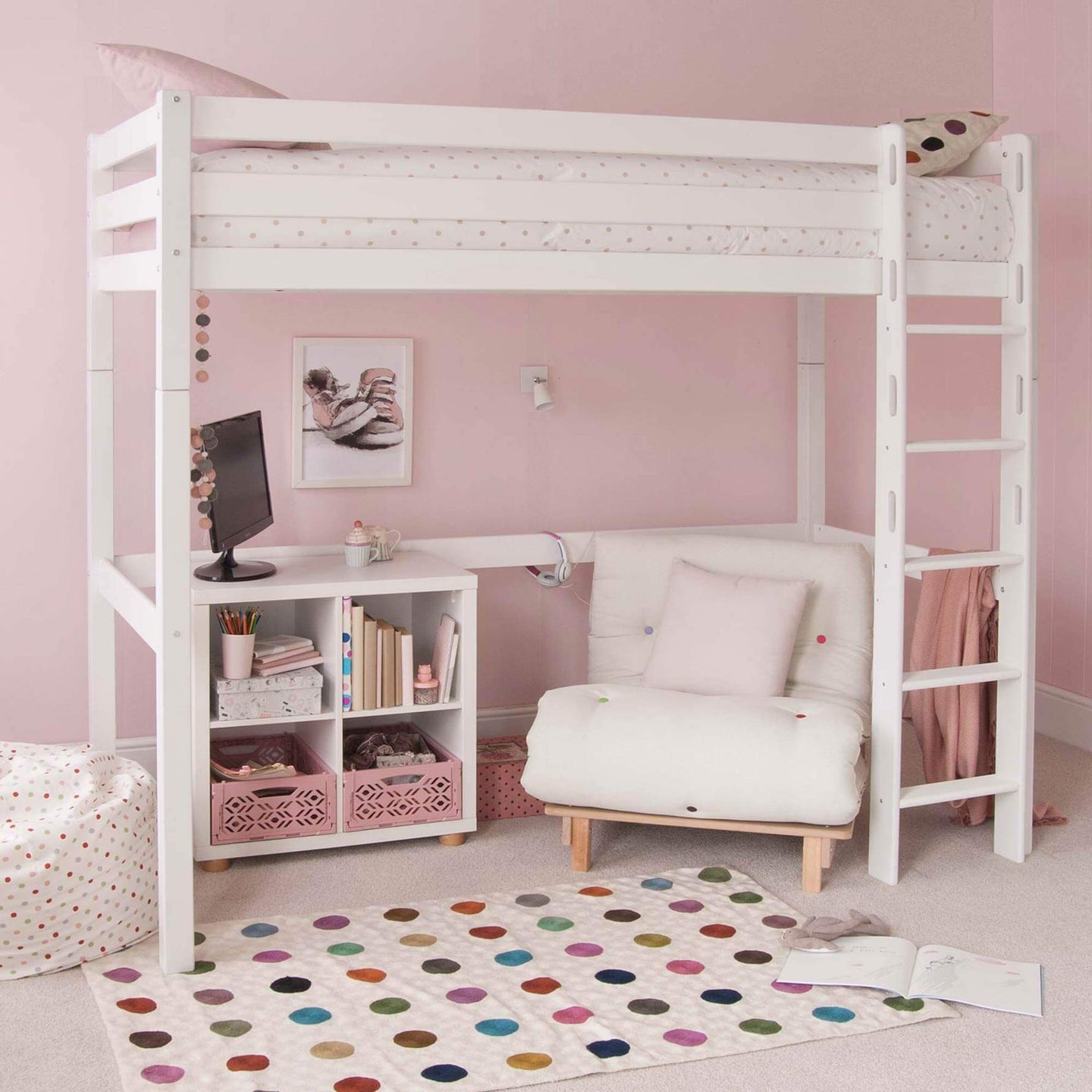 Classic beech high sleeper bed with futon chair, white desk, and storage in kids' room.