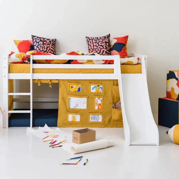 ECO Dream mid sleeper bed with slide for children, solid pine wood, storage space, water-based lacquer, fun playground style.