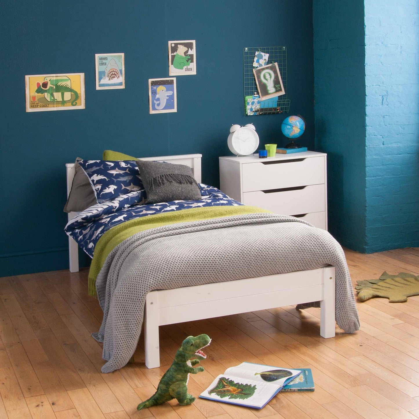 Classic Beech Single Bed with slatted headboard, styled in a children's room with blue walls and wood flooring.