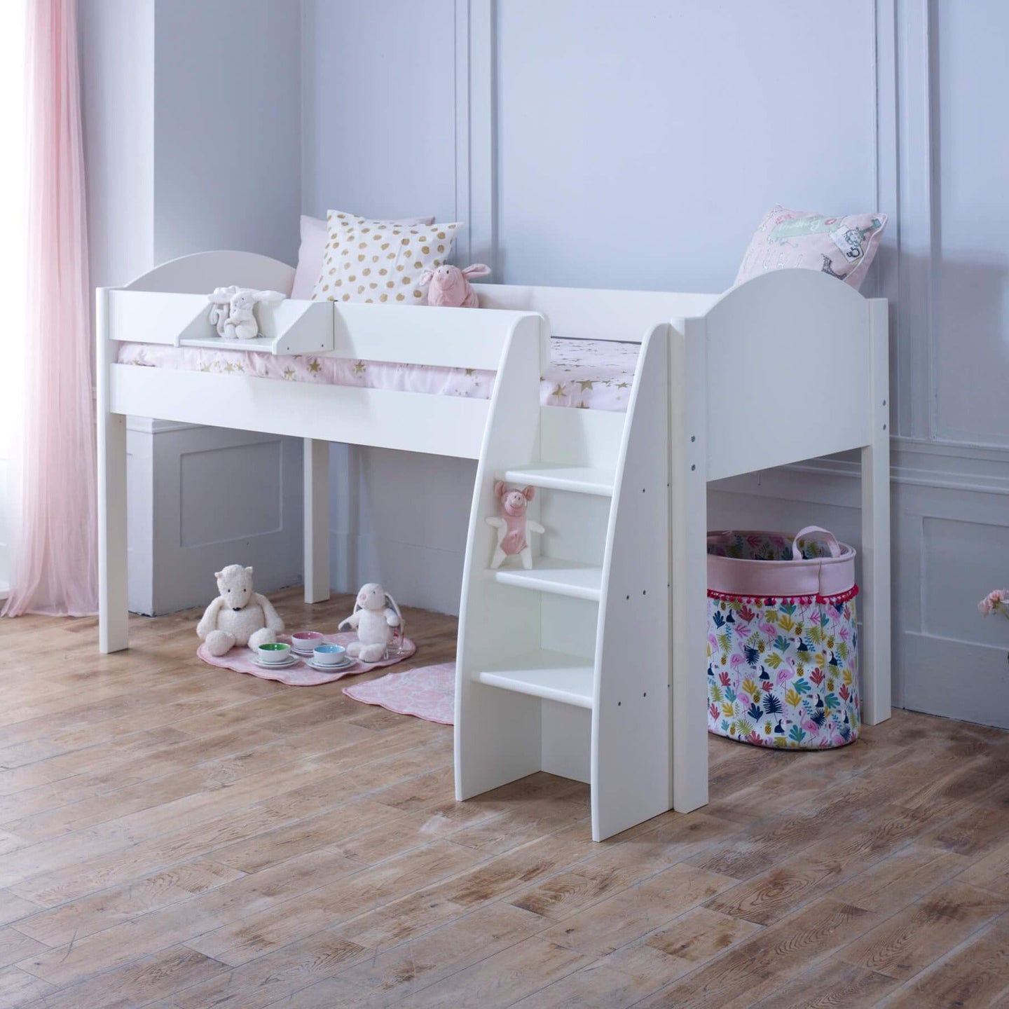 Mid Sleeper Bed with customizable white bed ends in a children's room.