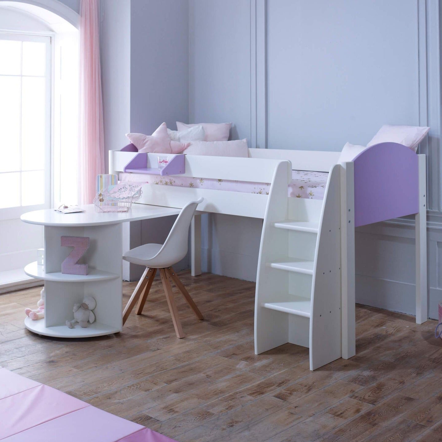 Mid Sleeper Bed with pull out desk, storage, and ladder in modern kids' room.