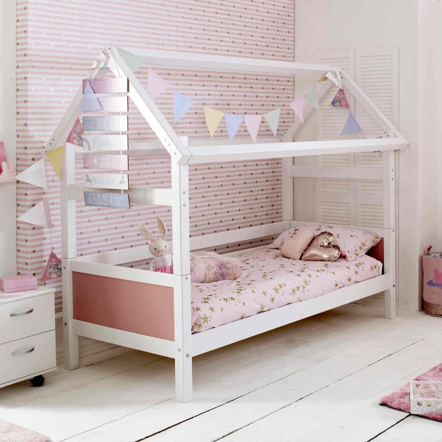 Nordic Playhouse bed with house frame, optional trundle, and storage drawers, suitable for kids ages 4 and above.