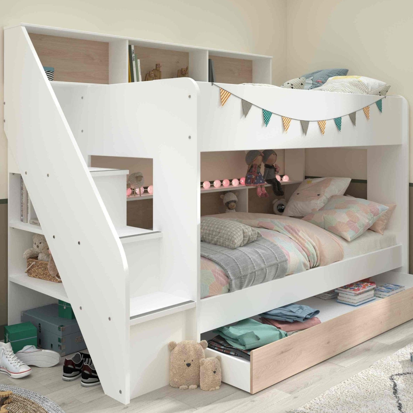 Bibliobed bunk bed with stairs, shelves, and optional trundle bed in a children's room, featuring integrated storage and stylish design.