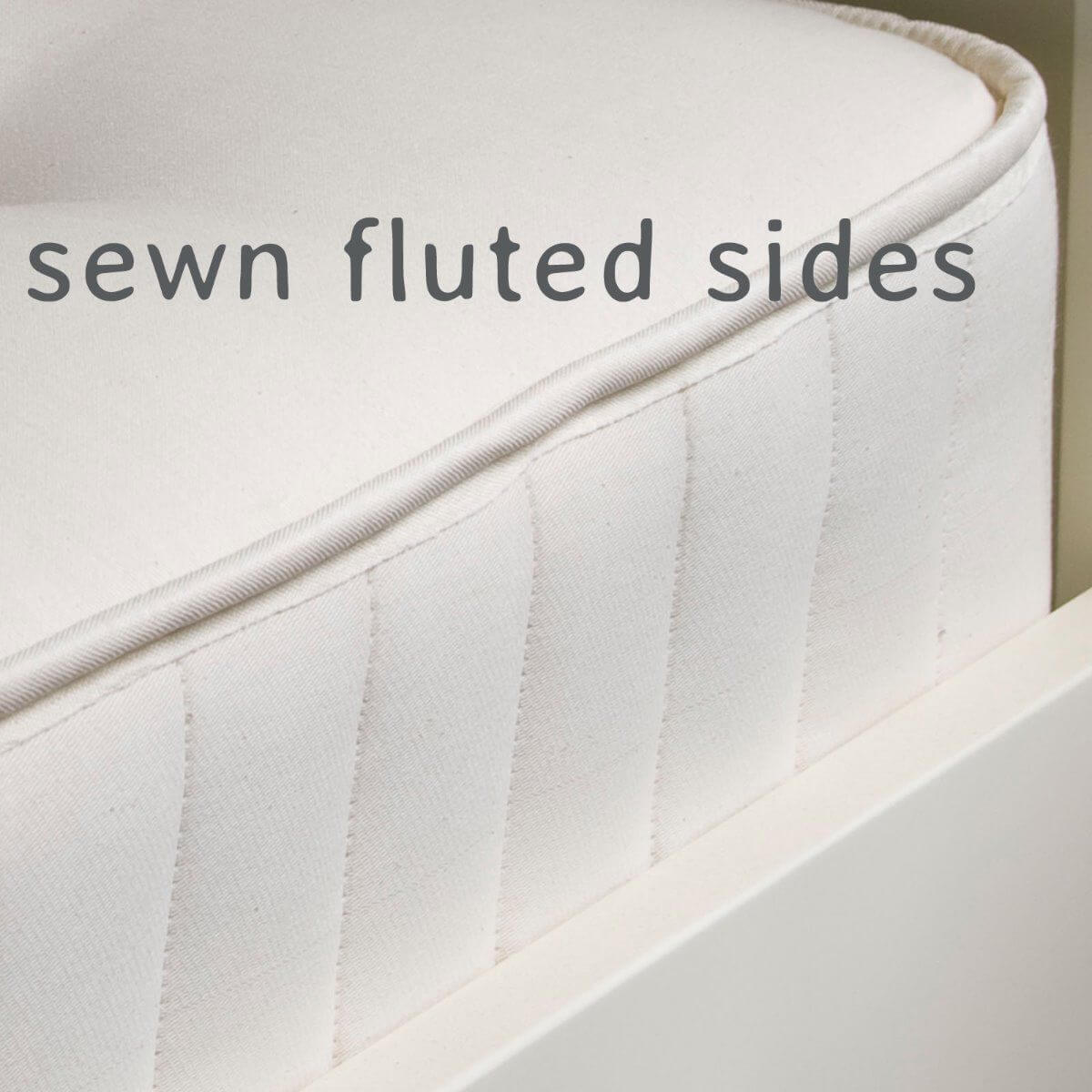 High Bed Pocket Sprung Single Mattress with cotton twill cover and hand-sewn fluted sides.