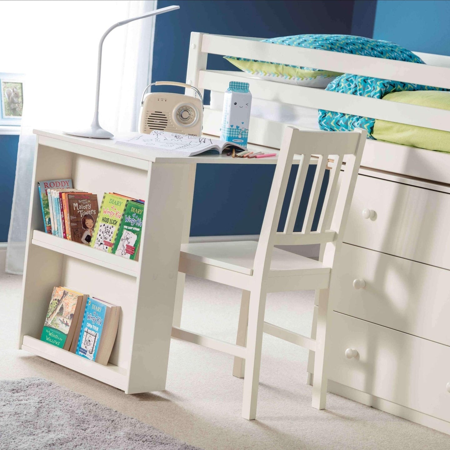 Roxy Sleepstation Mid Sleeper Bed with desk, storage drawers, and bookshelves, ideal for kids' rooms.