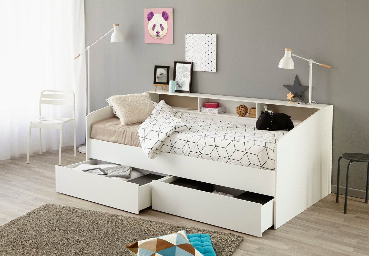 Sleep Daybed with white finish, built-in shelving, two storage drawers, ideal for space-saving and organization.