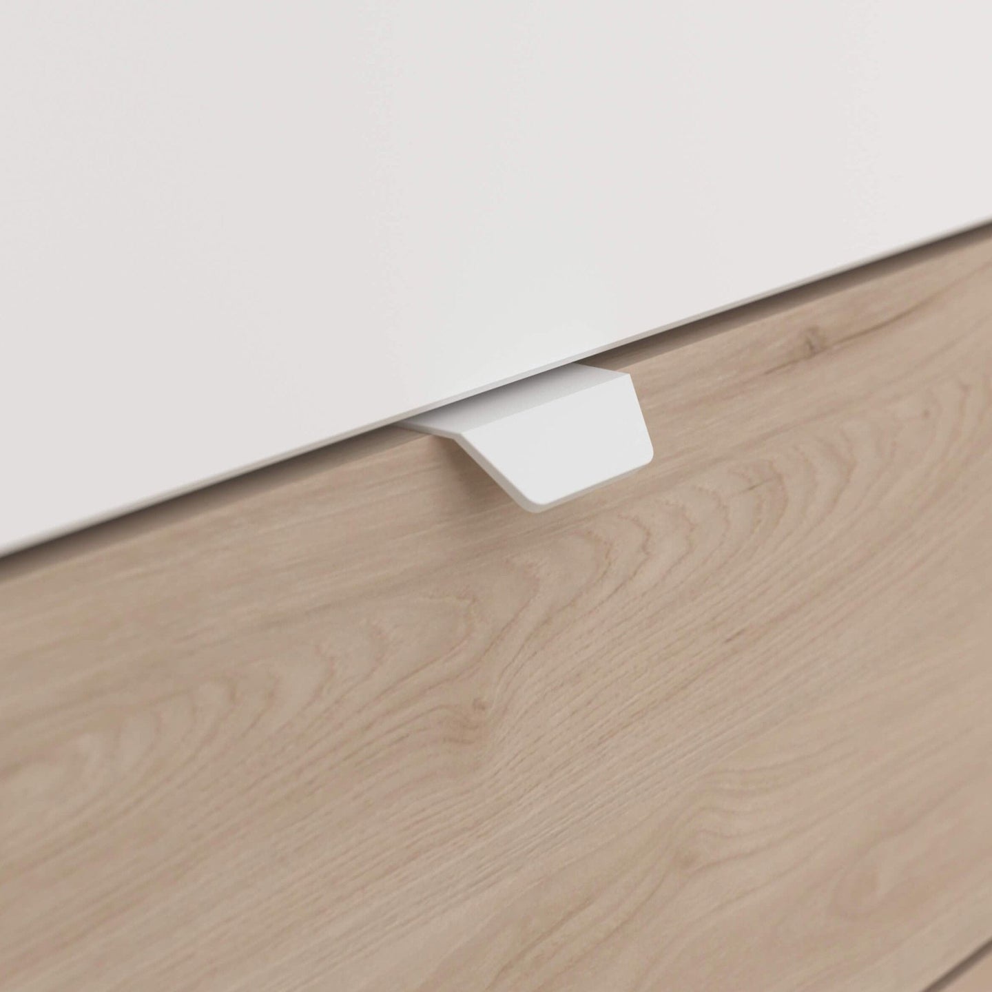 Close-up of drawer handle on Tobo Mid Sleeper Bed in white and light oak.