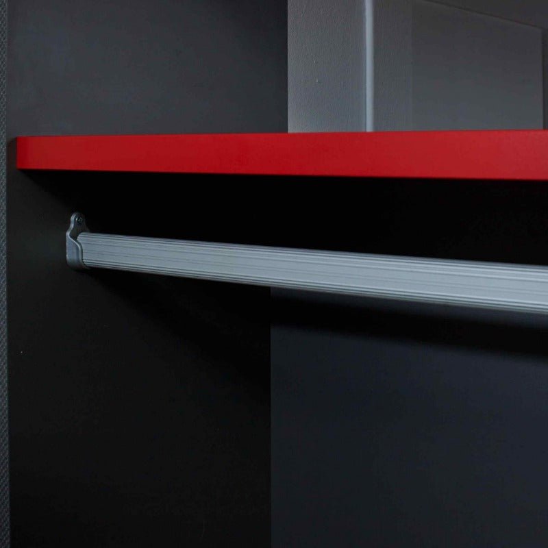 Clothes hanging rail under a red shelf from the 'LOFTPOD' Gaming Bed with desk and optional sofa bed.